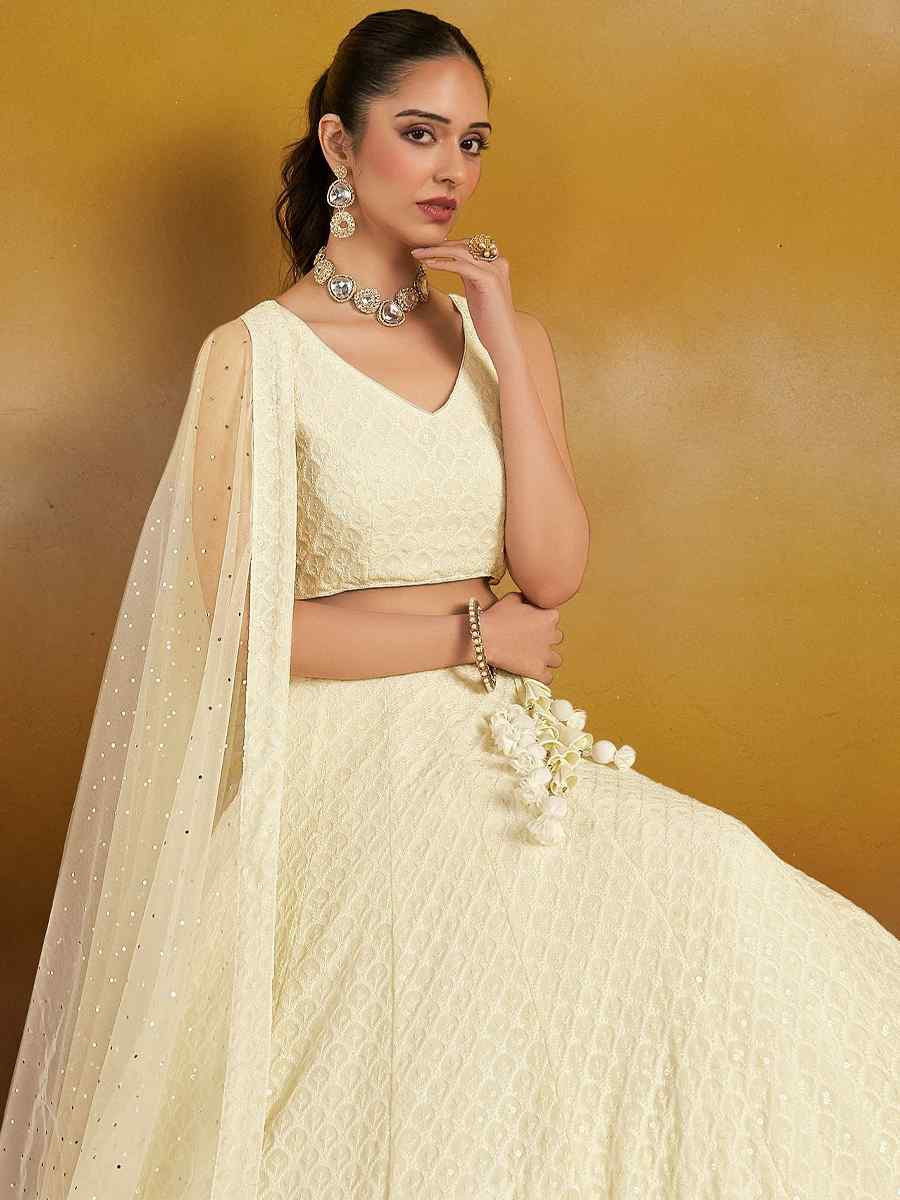 Off-White Georgette Embroidered Reception Wedding Heavy Border Lehenga Choli