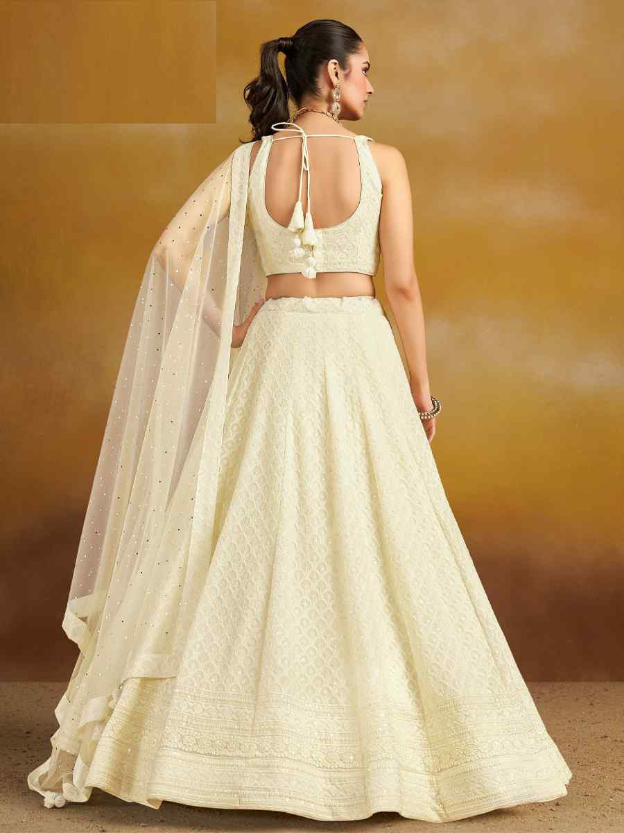 Off-White Georgette Embroidered Reception Wedding Heavy Border Lehenga Choli