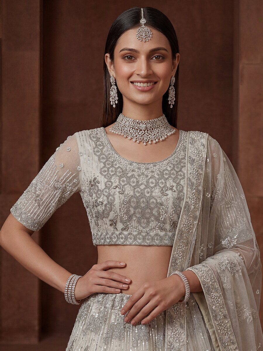Off White Net Embroidery Sequins Wedding Reception Party Festival Heavy Border Lehenga Choli