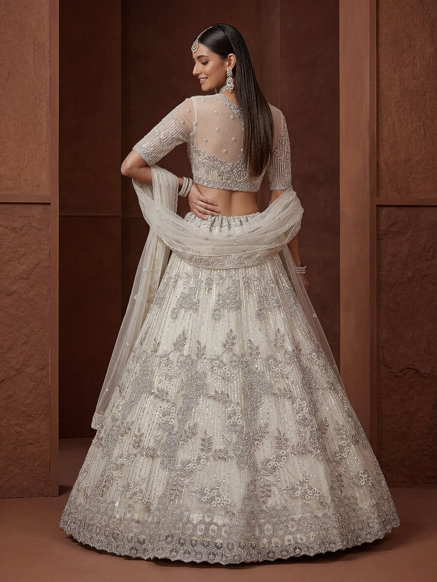 Off White Net Embroidery Sequins Wedding Reception Party Festival Heavy Border Lehenga Choli