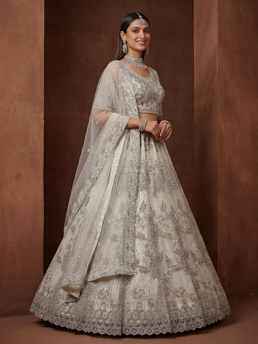 Off White Net Embroidery Sequins Wedding Reception Party Festival Heavy Border Lehenga Choli