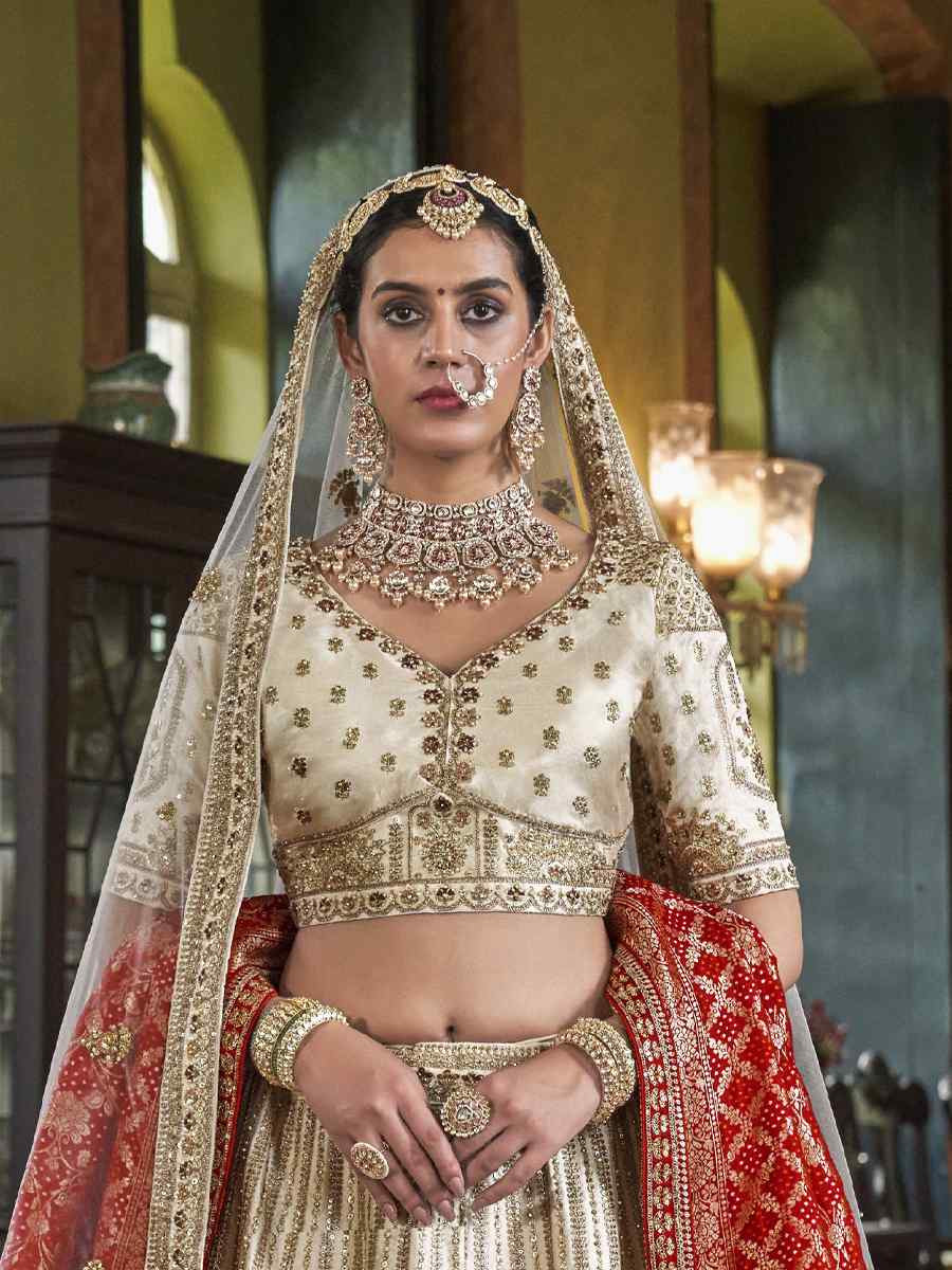 Off-White Silk Embroidered Bridal Wedding Reception Festival Heavy Border Lehenga Choli
