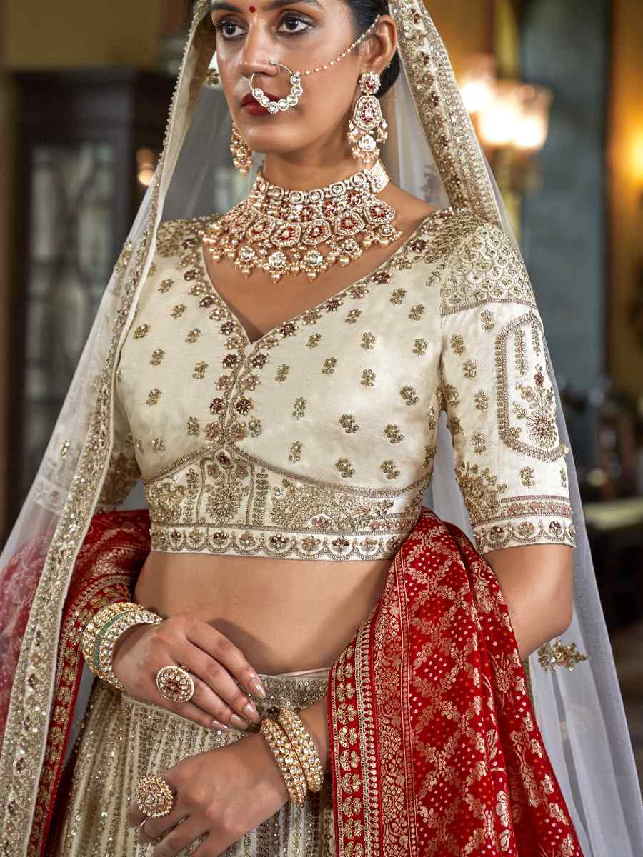 Off-White Silk Embroidered Bridal Wedding Reception Festival Heavy Border Lehenga Choli