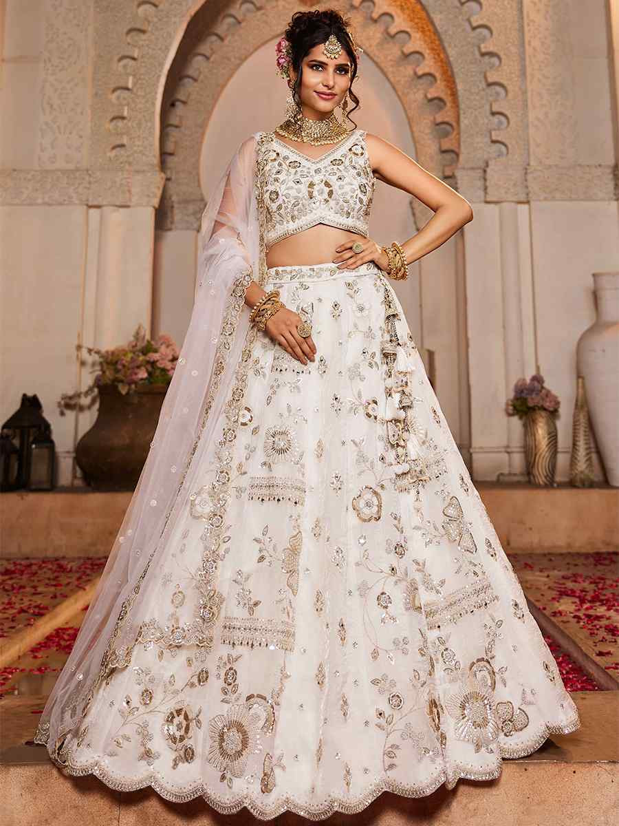 Off White Tissue Embroidered Reception Wedding Heavy Border Lehenga Choli