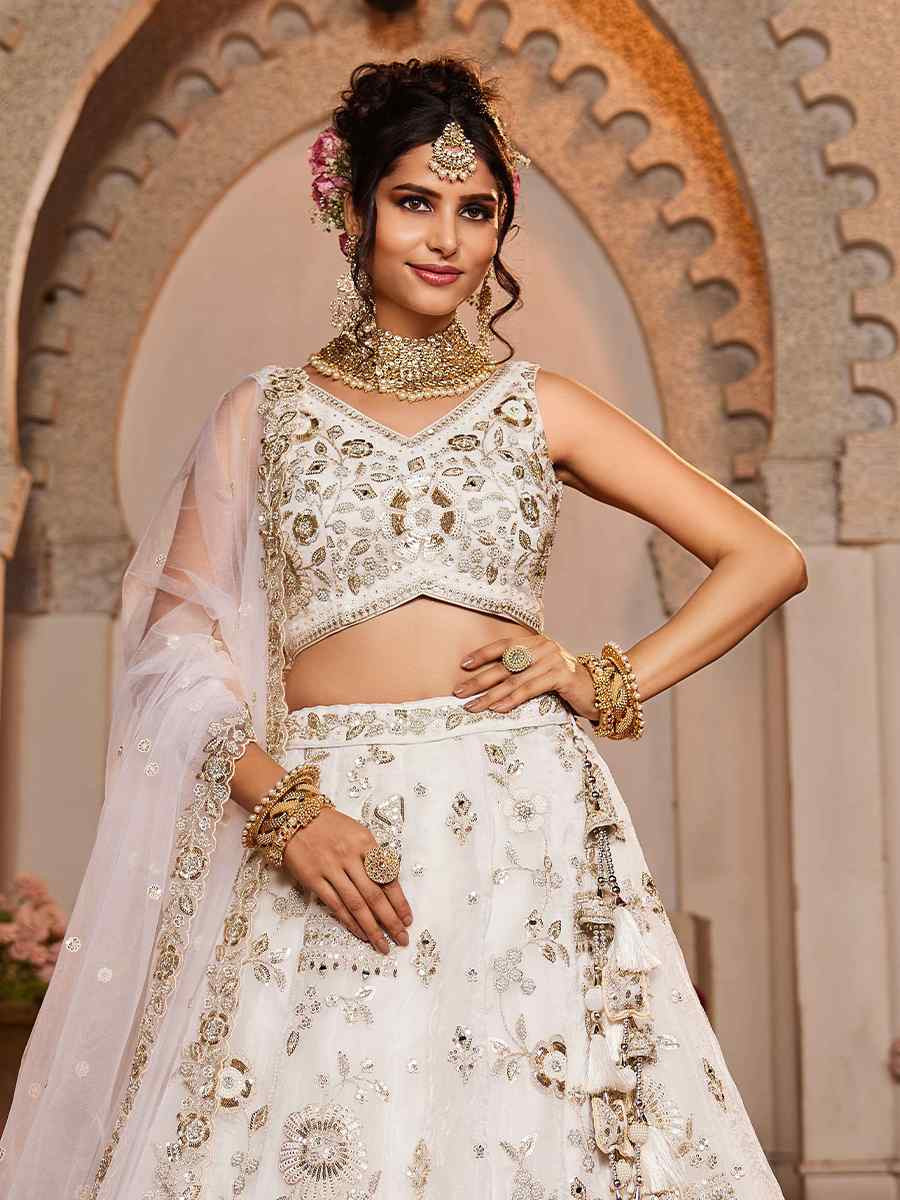 Off White Tissue Embroidered Reception Wedding Heavy Border Lehenga Choli