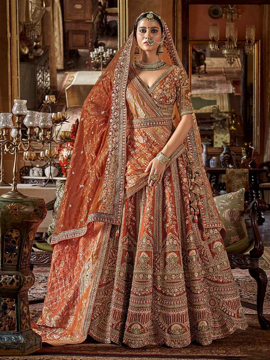 Orange Silk Embroidered Bridal Wedding Reception Festival Heavy Border Lehenga Choli