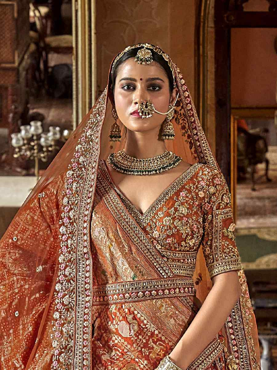 Orange Silk Embroidered Bridal Wedding Reception Festival Heavy Border Lehenga Choli