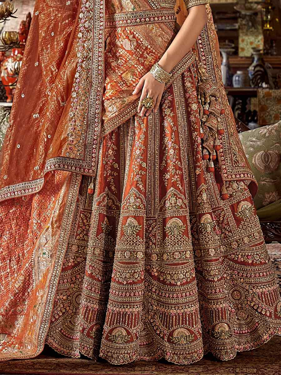 Orange Silk Embroidered Bridal Wedding Reception Festival Heavy Border Lehenga Choli