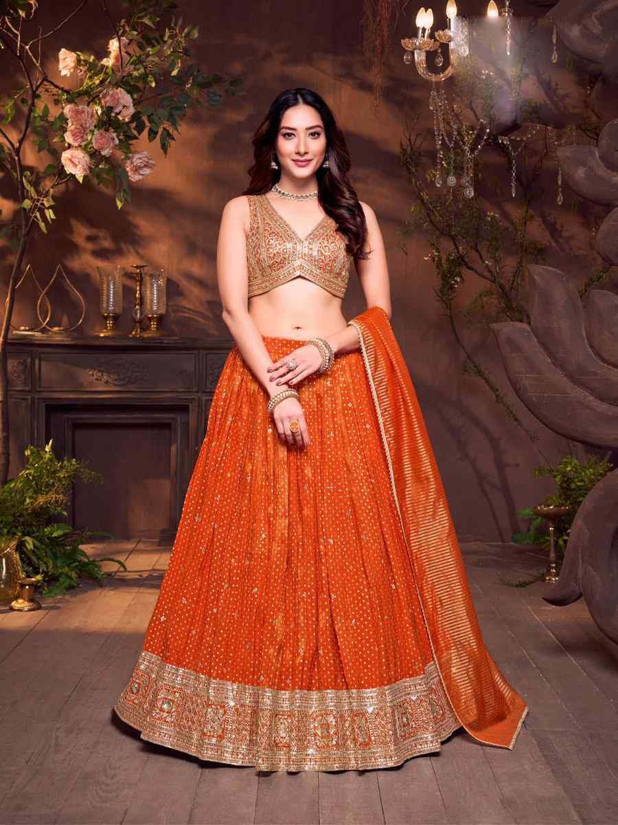 Orange Silk Embroidered Wedding Reception Festival Ready Heavy Border Lehenga Choli