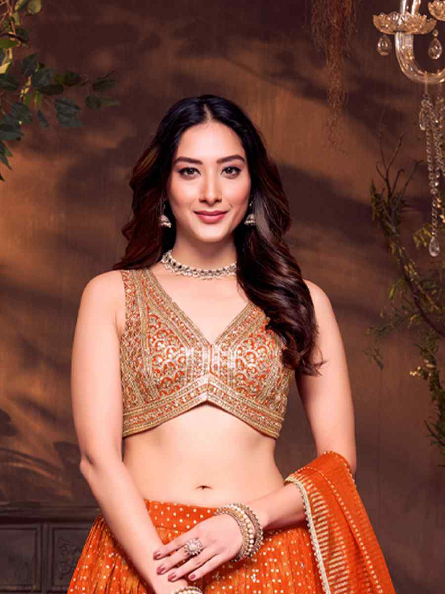 Orange Silk Embroidered Wedding Reception Festival Ready Heavy Border Lehenga Choli