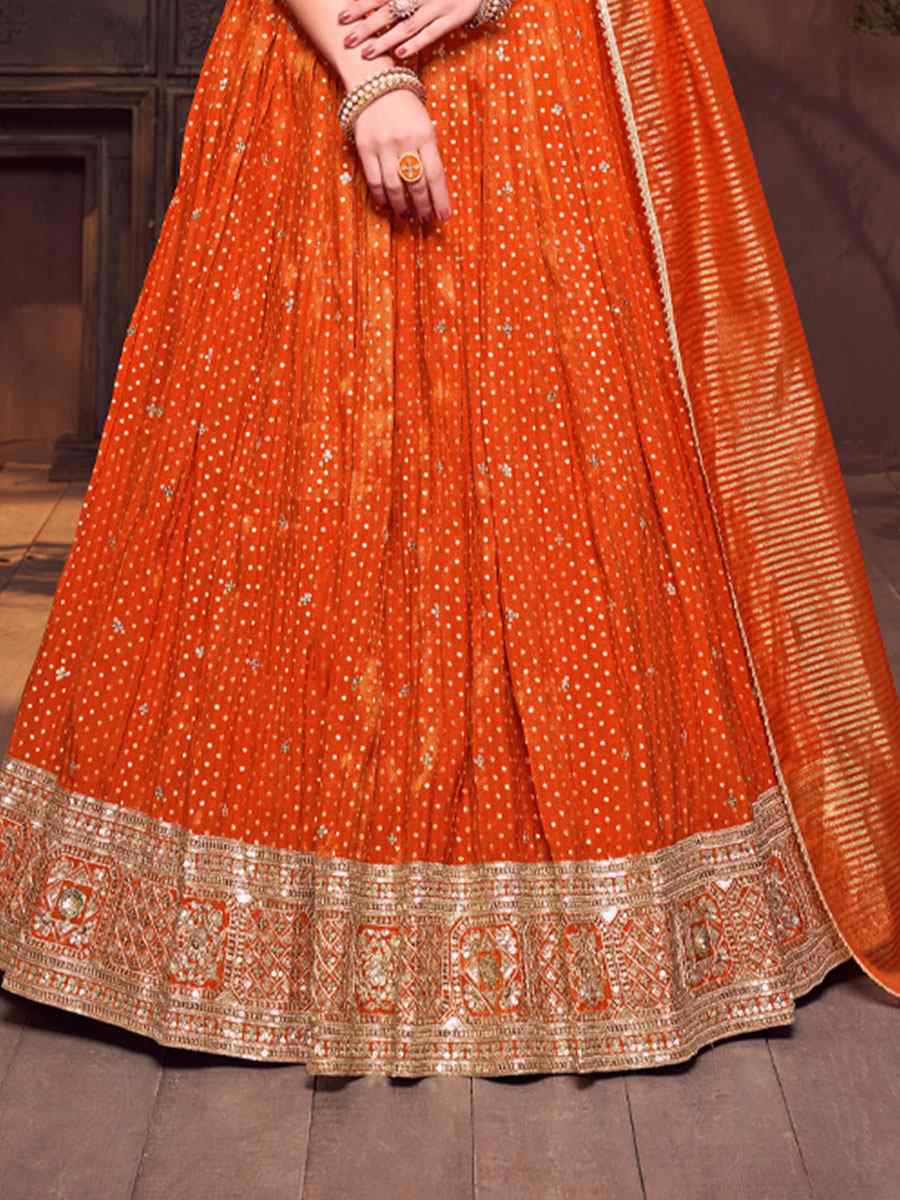 Orange Silk Embroidered Wedding Reception Festival Ready Heavy Border Lehenga Choli