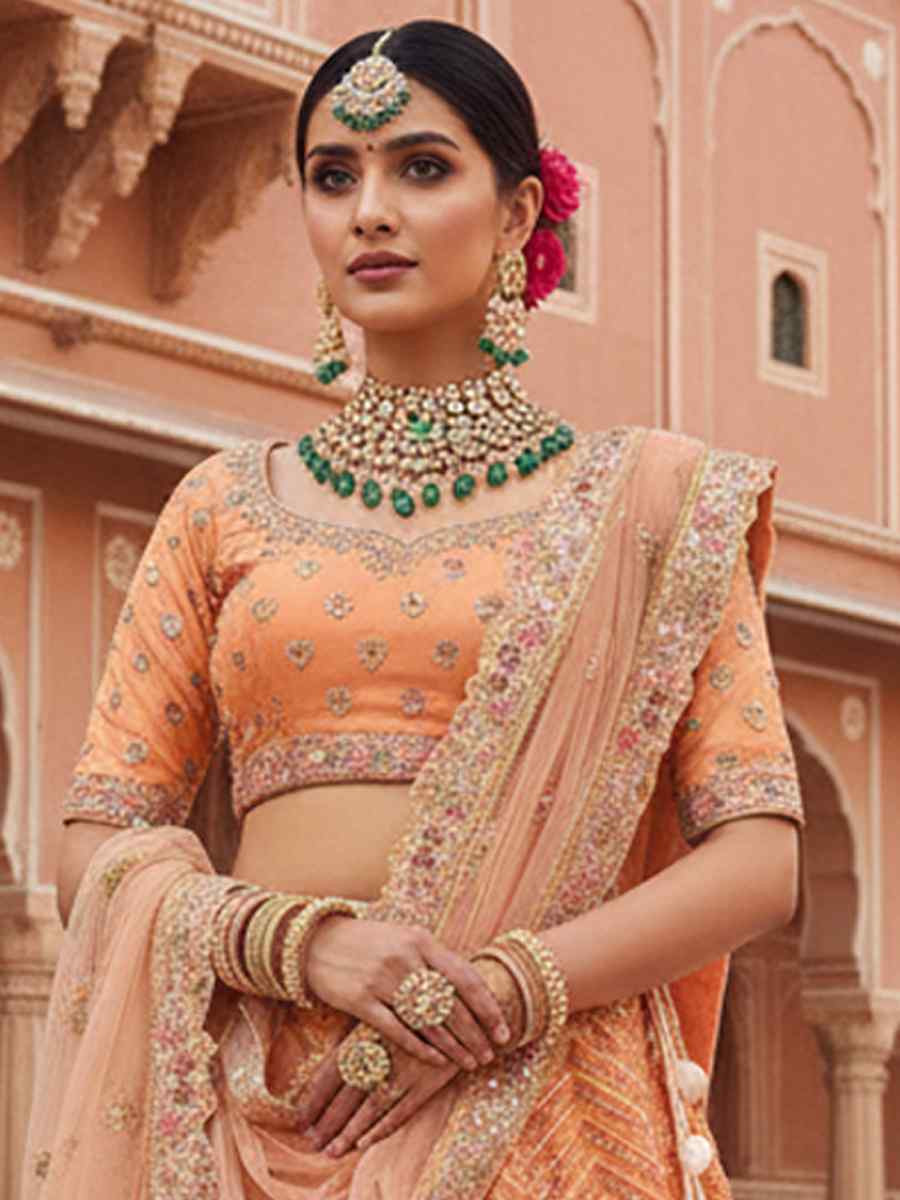 Peach Georgette Embroidered Wedding Reception Festival Heavy Border Lehenga Choli