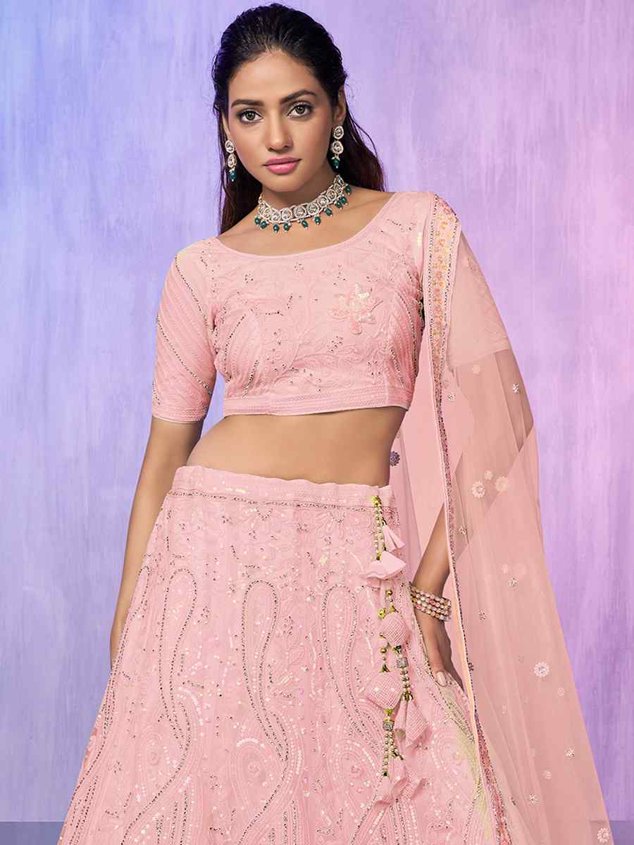 Peach Net Embroidered Bridal Reception Heavy Border Lehenga Choli