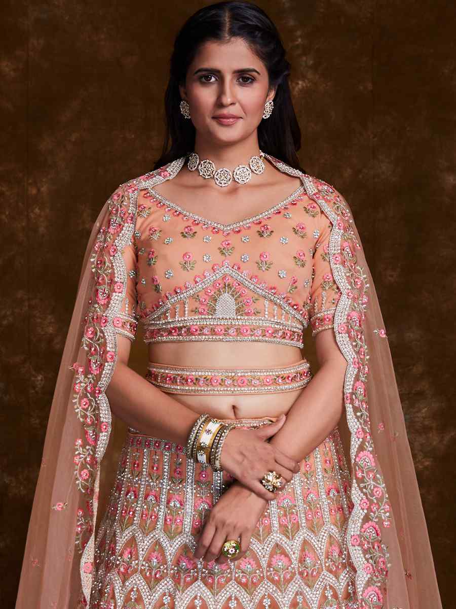 Peach Net Embroidered Bridal Wedding Heavy Border Lehenga Choli