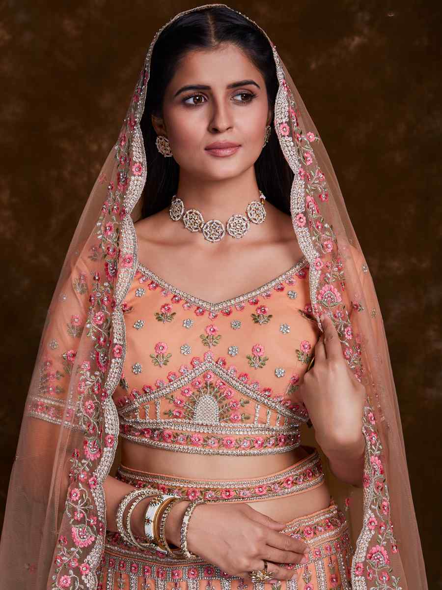 Peach Net Embroidered Bridal Wedding Heavy Border Lehenga Choli
