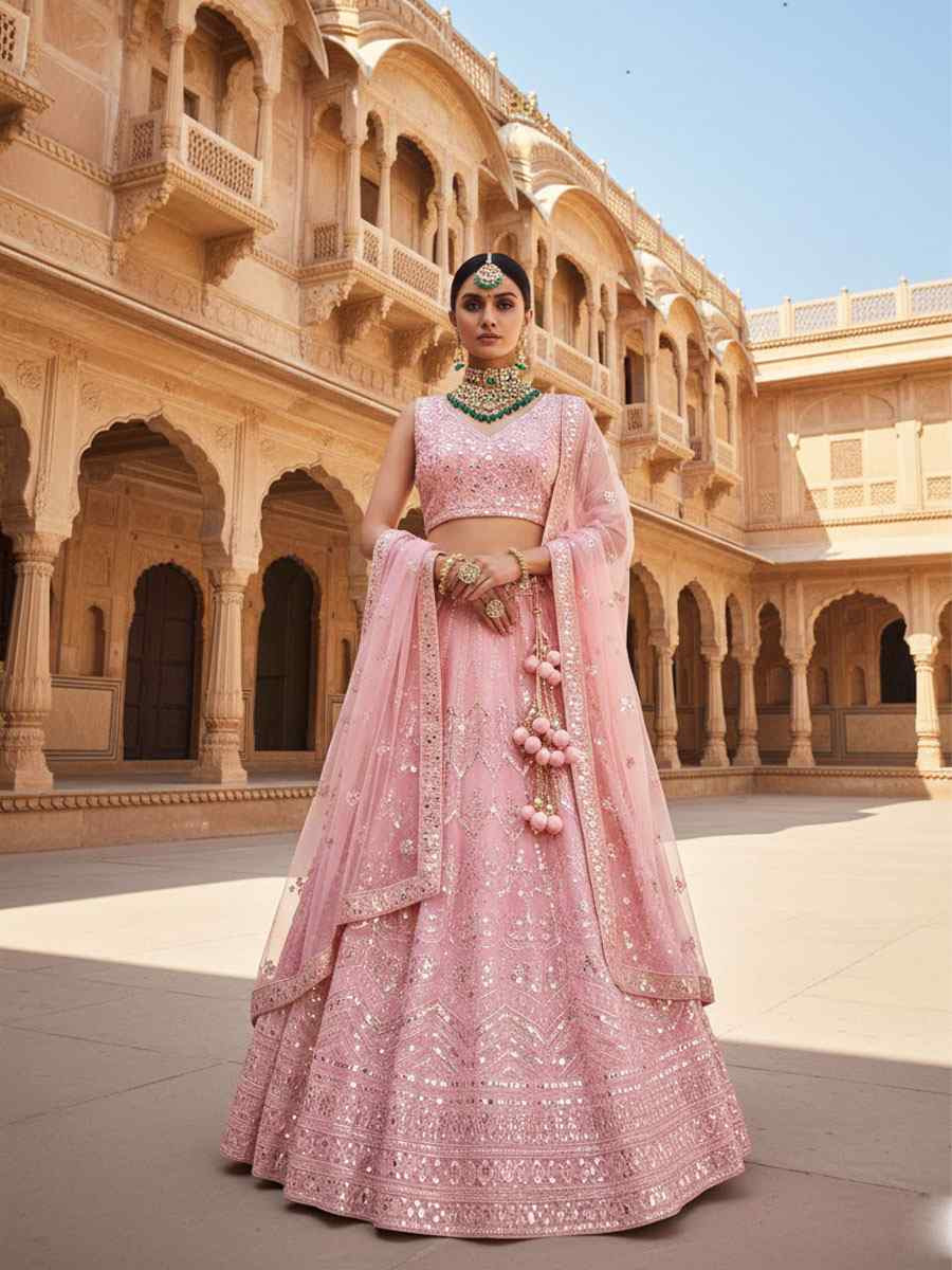 Peach Net Embroidered Bridal Wedding Reception Festival Heavy Border Lehenga Choli