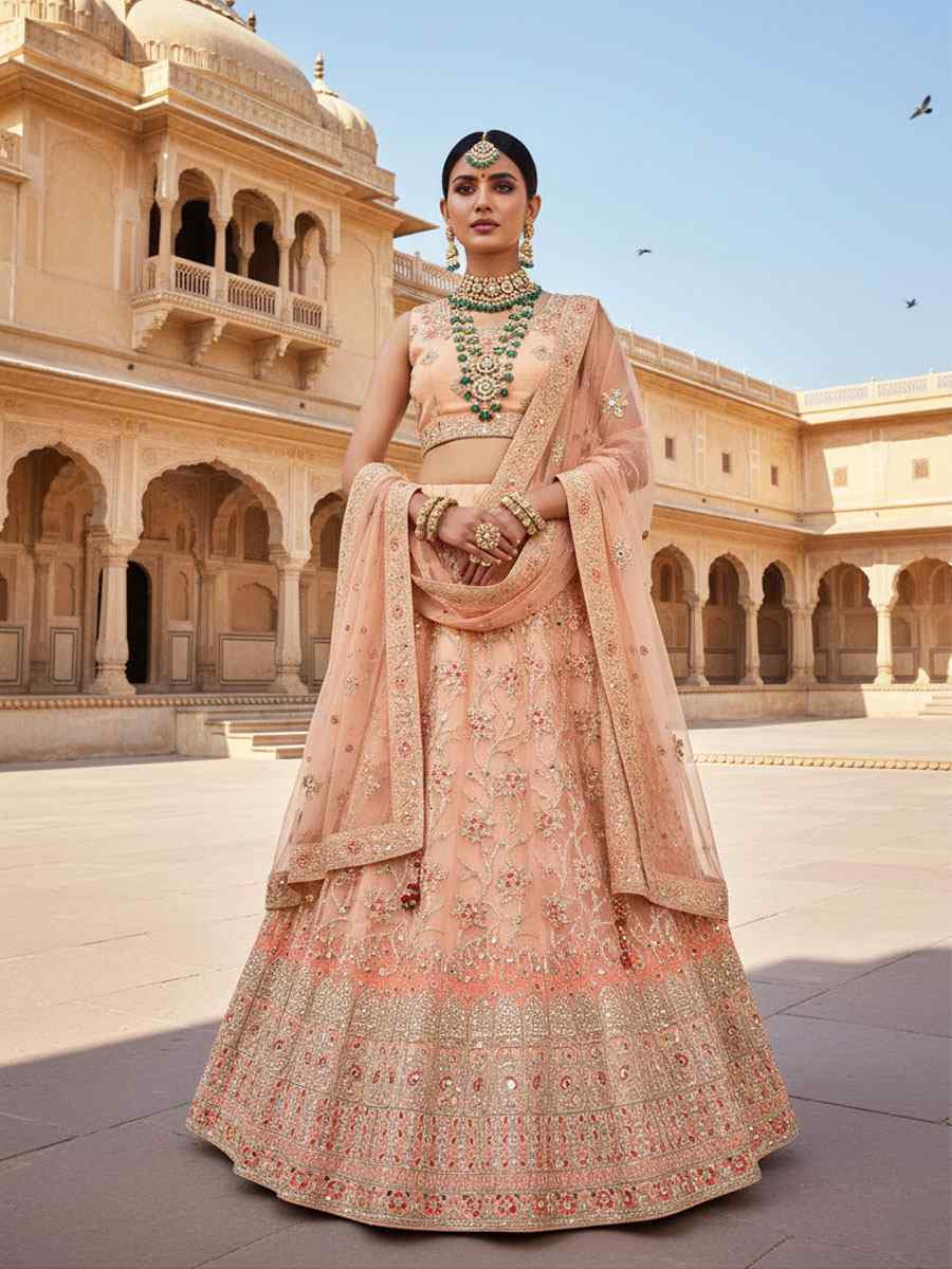 Peach Net Embroidered Bridal Wedding Reception Festival Heavy Border Lehenga Choli