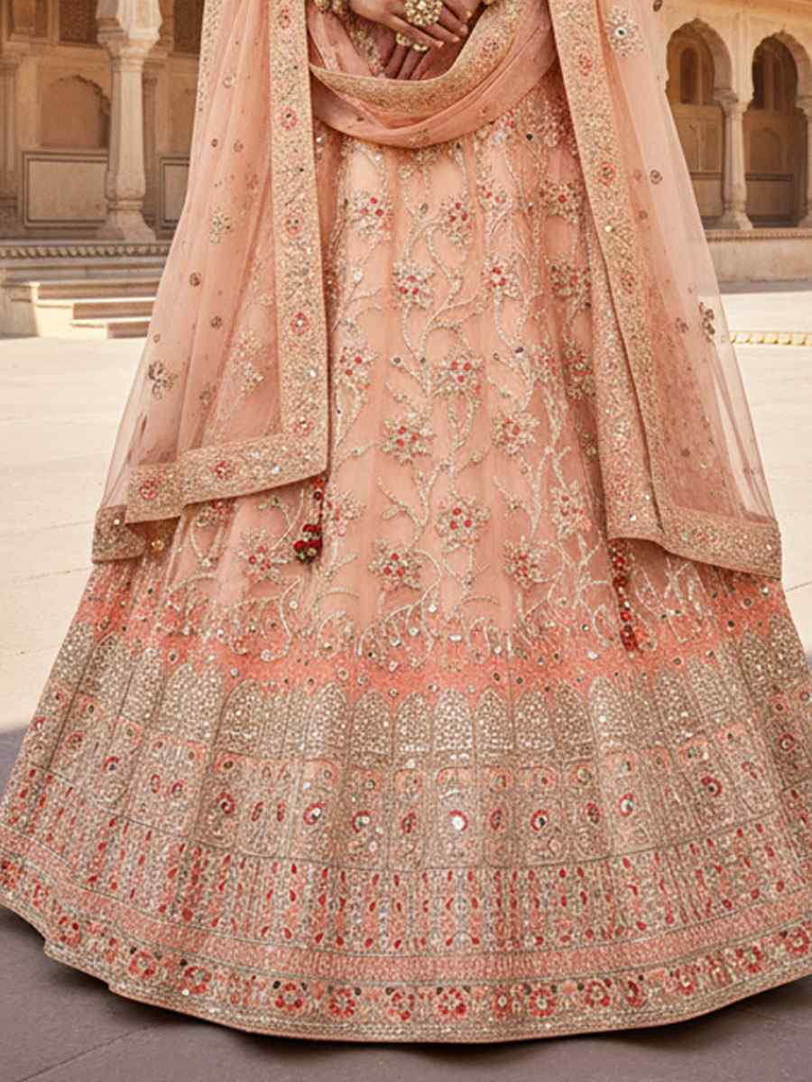 Peach Net Embroidered Bridal Wedding Reception Festival Heavy Border Lehenga Choli