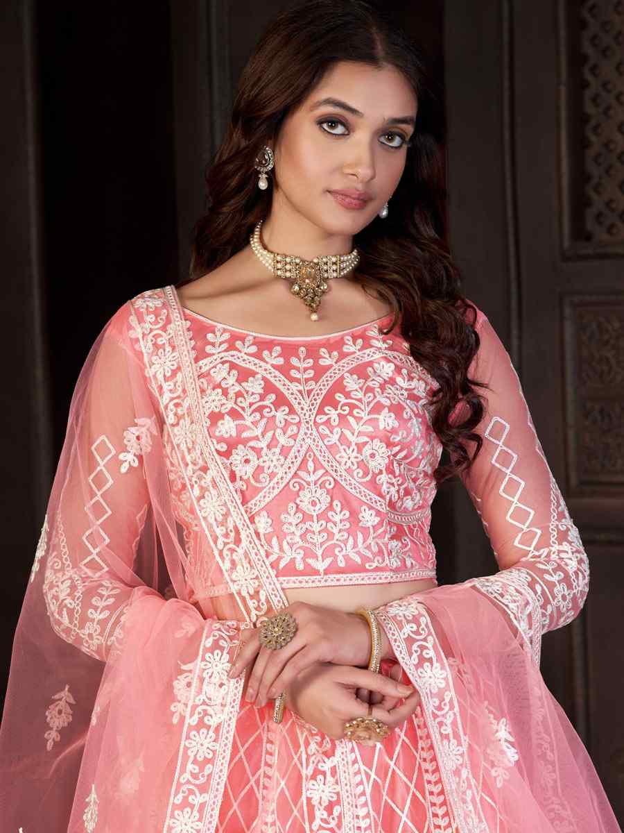 Peach Net Embroidered Reception Wedding Heavy Border Lehenga Choli