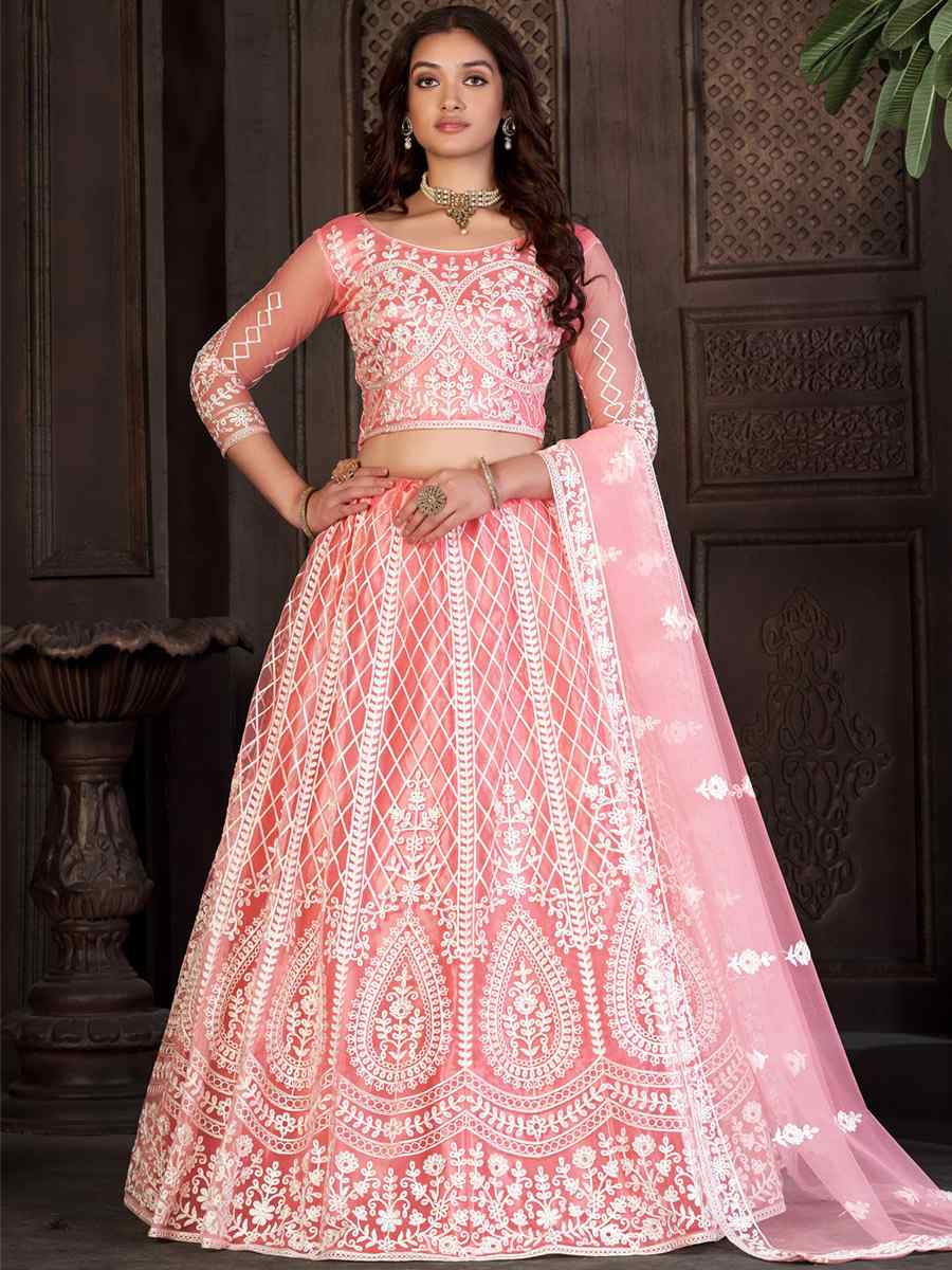 Peach Net Embroidered Reception Wedding Heavy Border Lehenga Choli