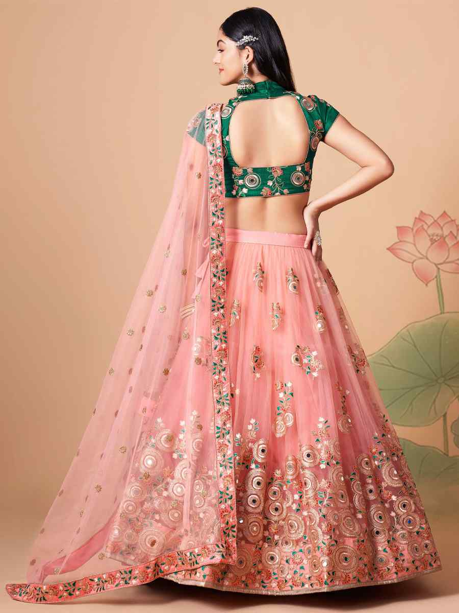 Peach Soft Net Embroidered Reception Festival Heavy Border Lehenga Choli