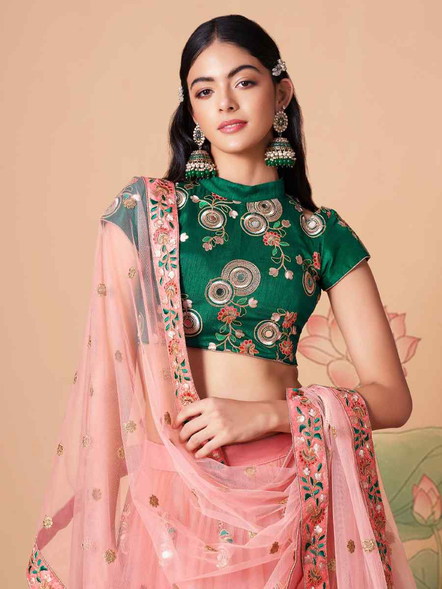 Peach Soft Net Embroidered Reception Festival Heavy Border Lehenga Choli