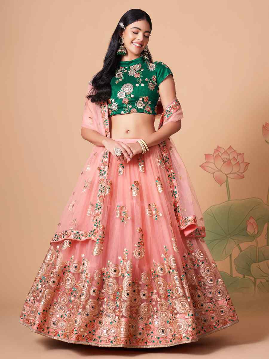 Peach Soft Net Embroidered Reception Festival Heavy Border Lehenga Choli