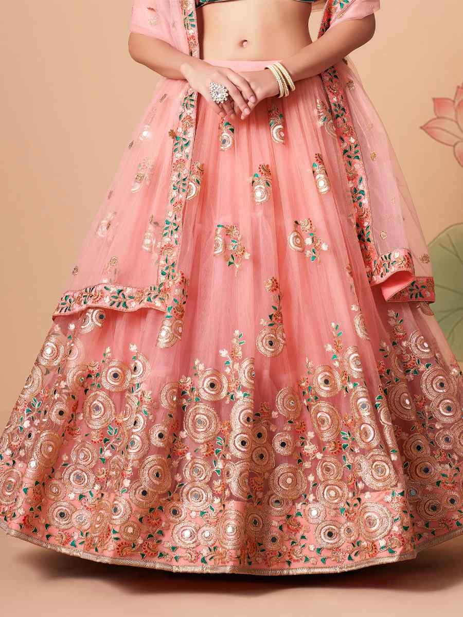 Peach Soft Net Embroidered Reception Festival Heavy Border Lehenga Choli