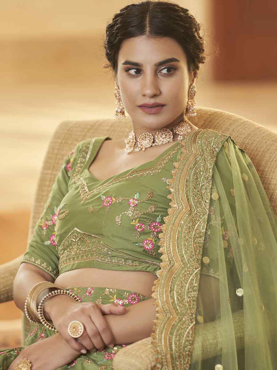 Pista Chinon Silk Embroidered Festival Party Wear Heavy Border Lehenga Choli