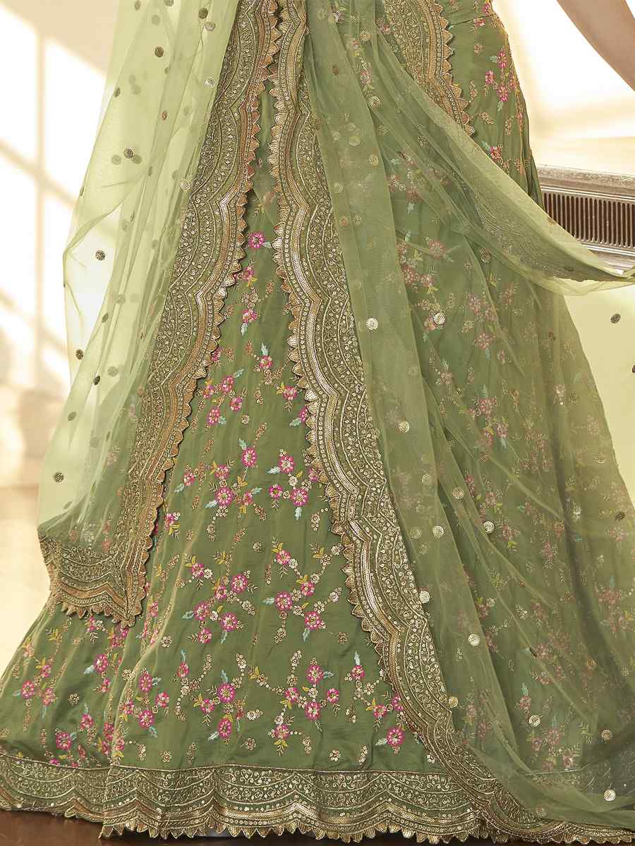 Pista Chinon Silk Embroidered Festival Party Wear Heavy Border Lehenga Choli