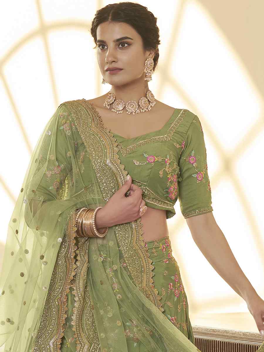 Pista Chinon Silk Embroidered Festival Party Wear Heavy Border Lehenga Choli