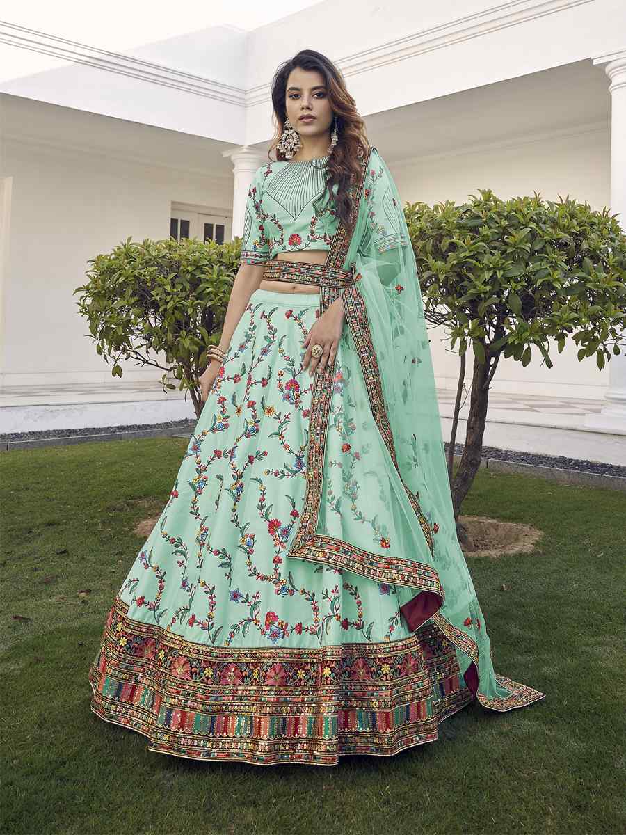 Pista Green Silk Embroidered Bridal Reception Heavy Border Lehenga Choli