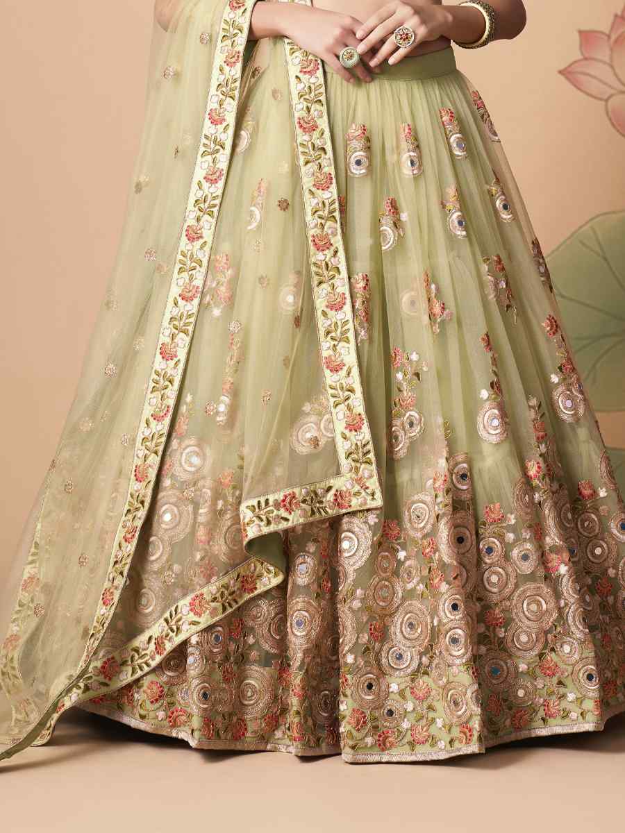Pista Green Soft Net Embroidered Reception Festival Heavy Border Lehenga Choli