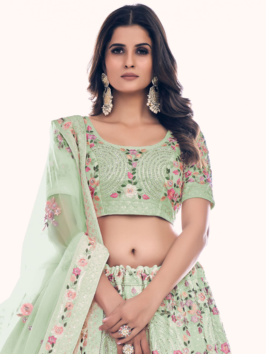 Pista Soft Net Embroidered Bridal Wedding Heavy Border Lehenga Choli