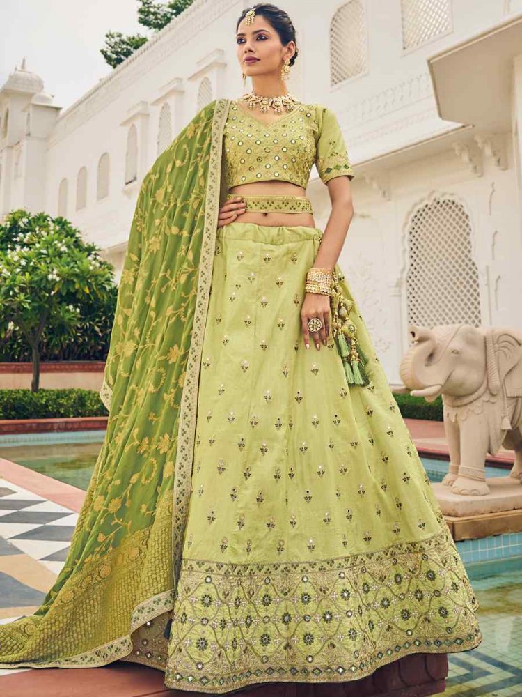 Pista Viscose Embroidered Reception Party Wear Heavy Border Lehenga Choli