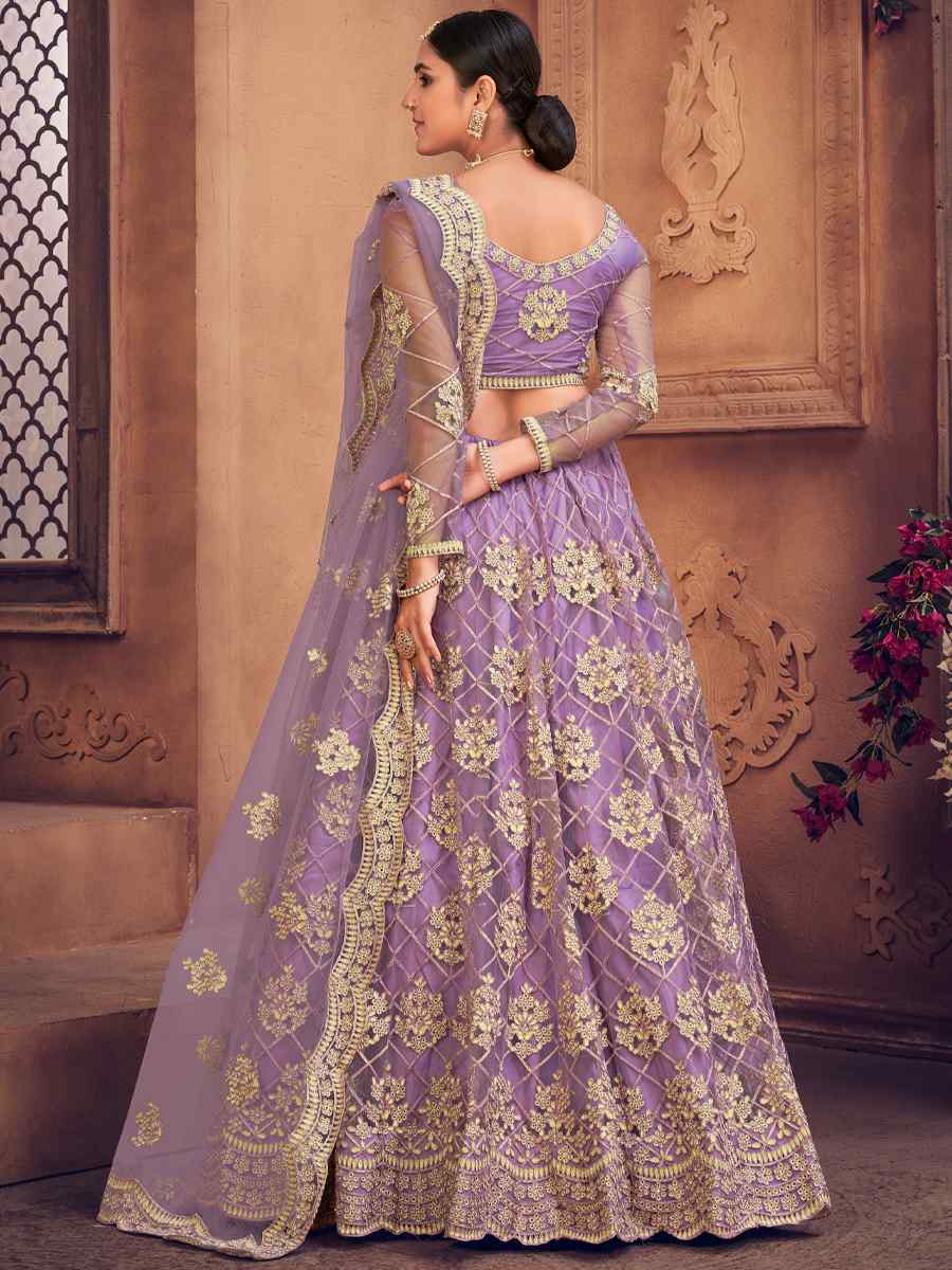 Purple Net Embroidered Festival Party Wear Heavy Border Lehenga Choli