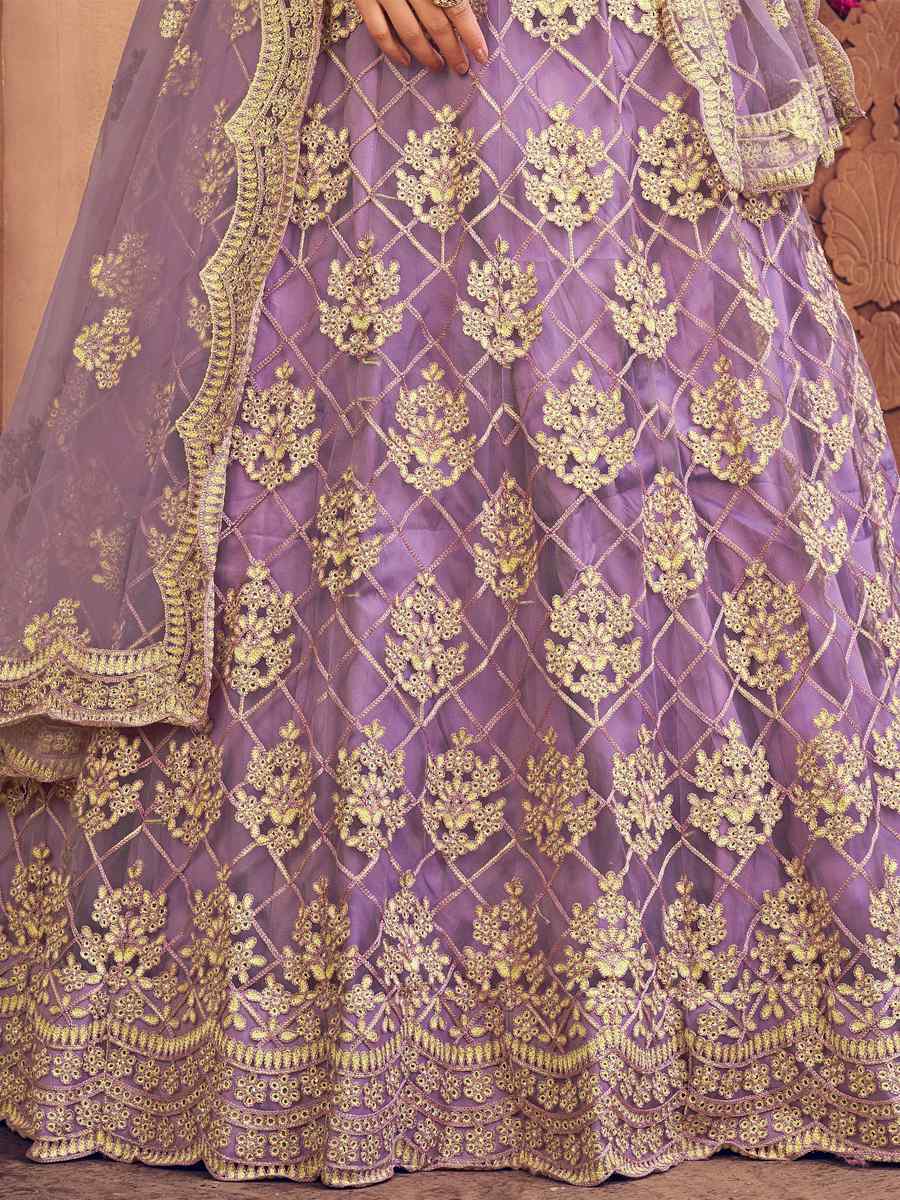 Purple Net Embroidered Festival Party Wear Heavy Border Lehenga Choli