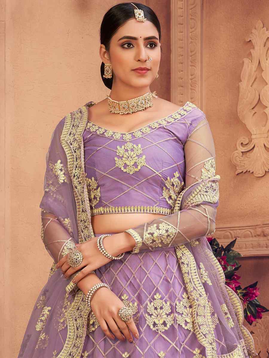 Purple Net Embroidered Festival Party Wear Heavy Border Lehenga Choli