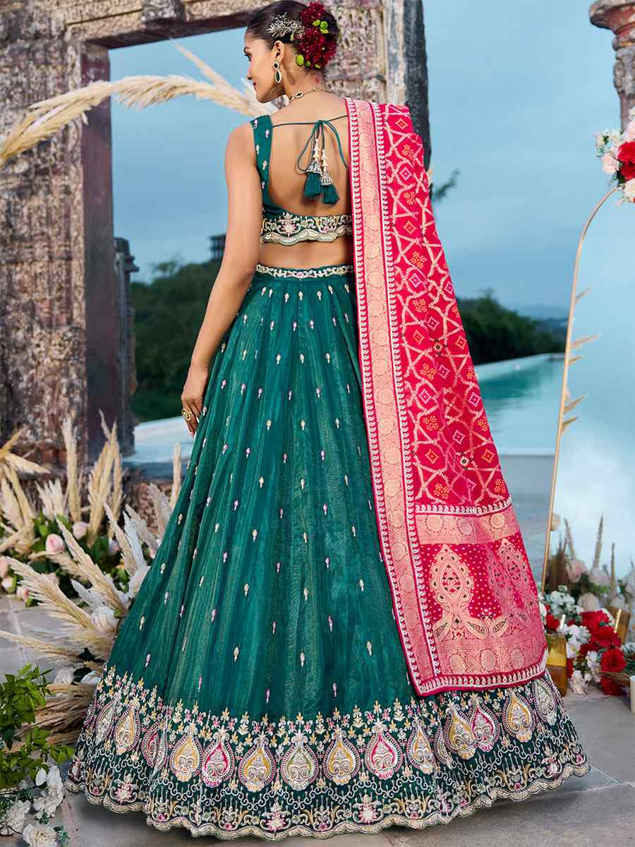 Rama Cosmos Silk Embroidered Wedding Reception Festival Heavy Border Lehenga Choli