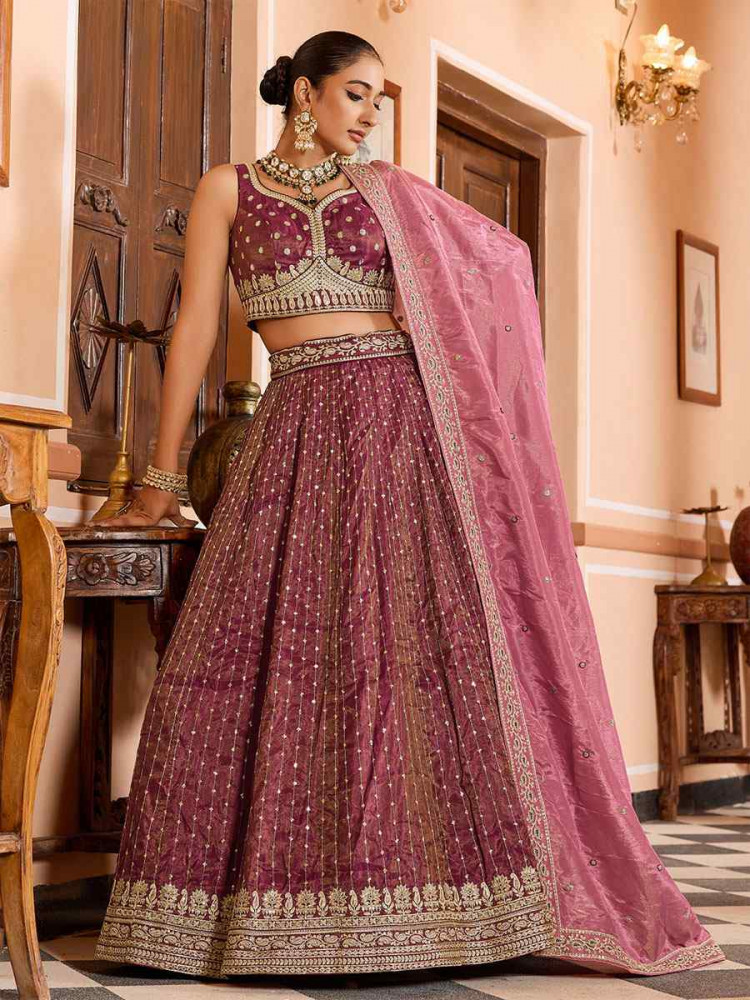 Image of Rose Gold Tissue Silk Embroidered Wedding Reception Festival Heavy Border Lehenga Choli