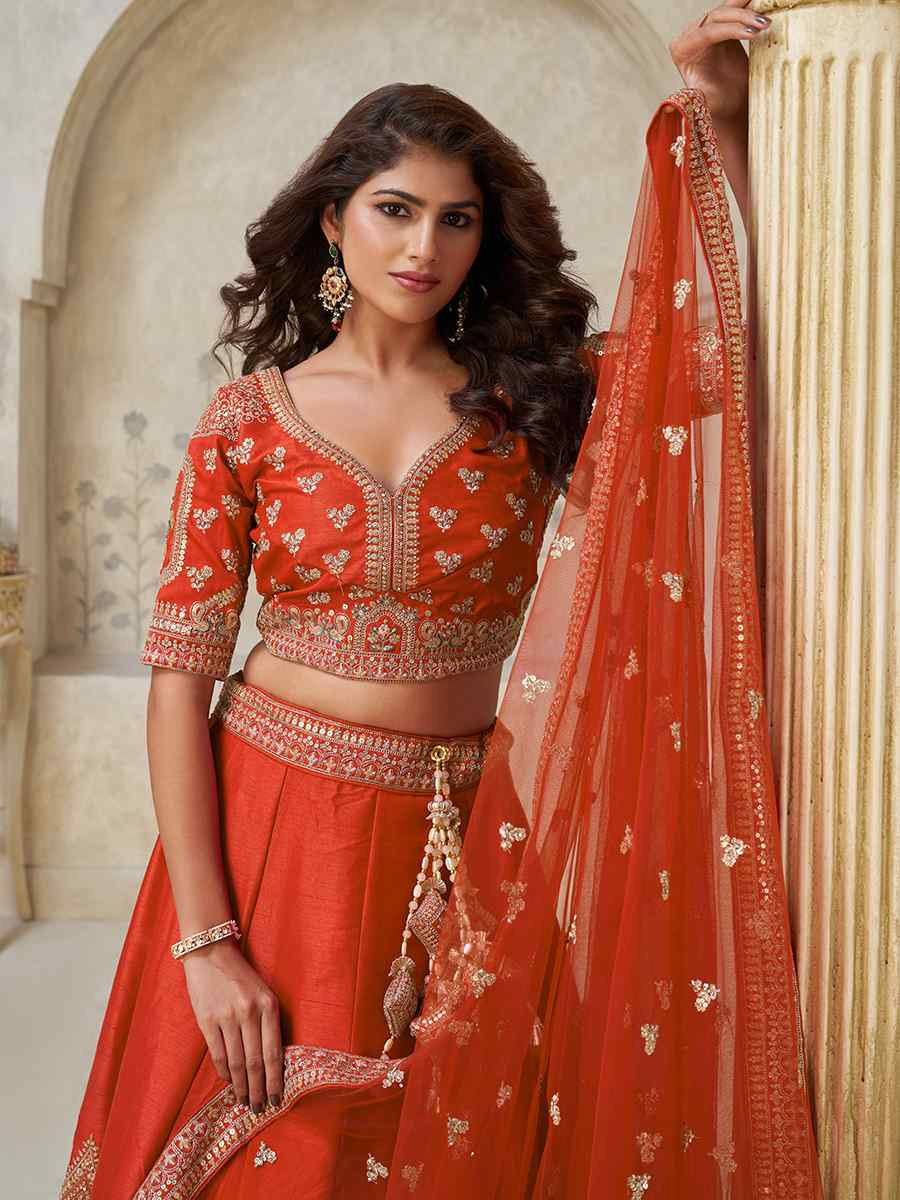 Rust Silk Embroidered Wedding Reception Festival Heavy Border Lehenga Choli