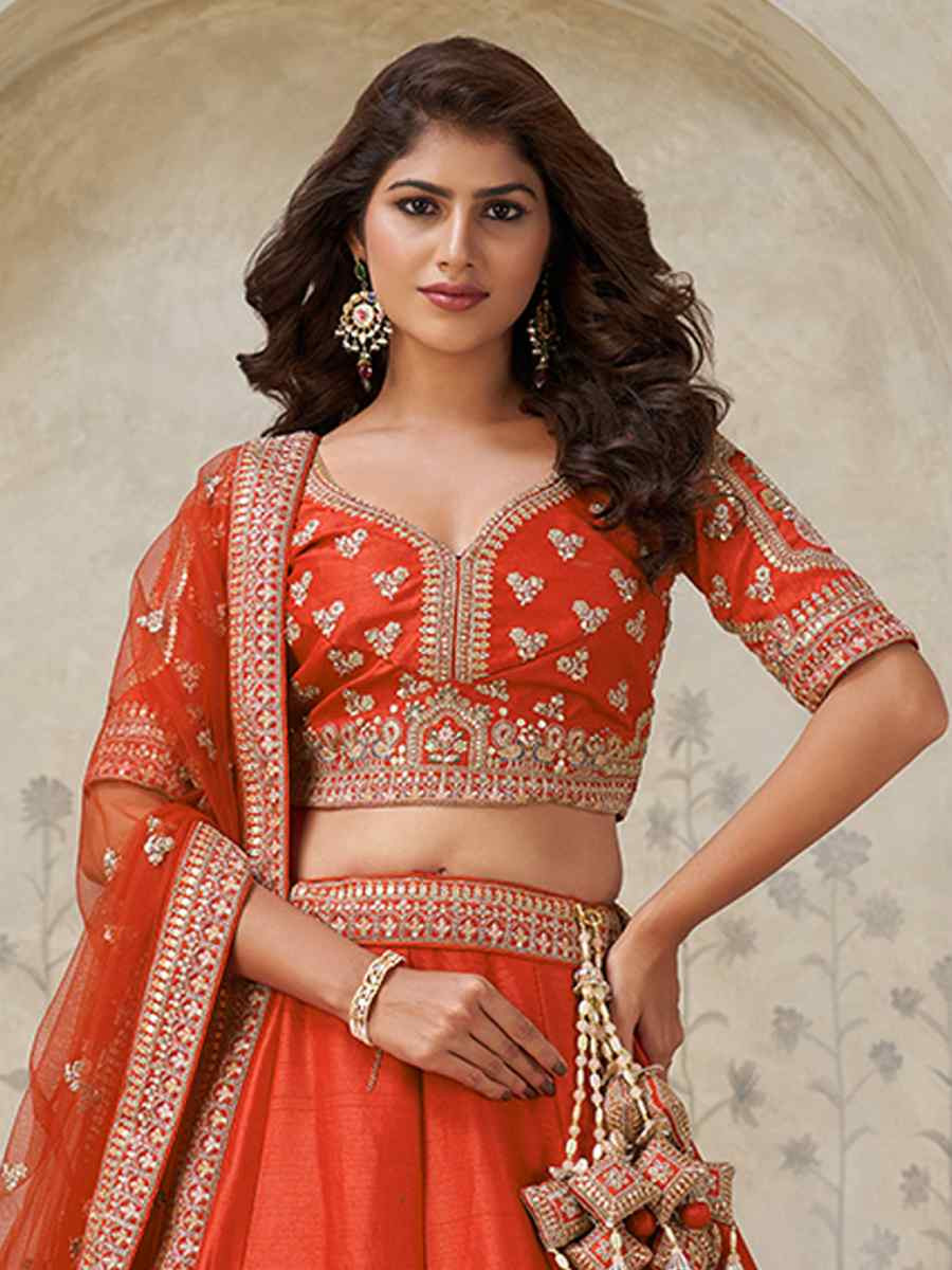 Rust Silk Embroidered Wedding Reception Festival Heavy Border Lehenga Choli