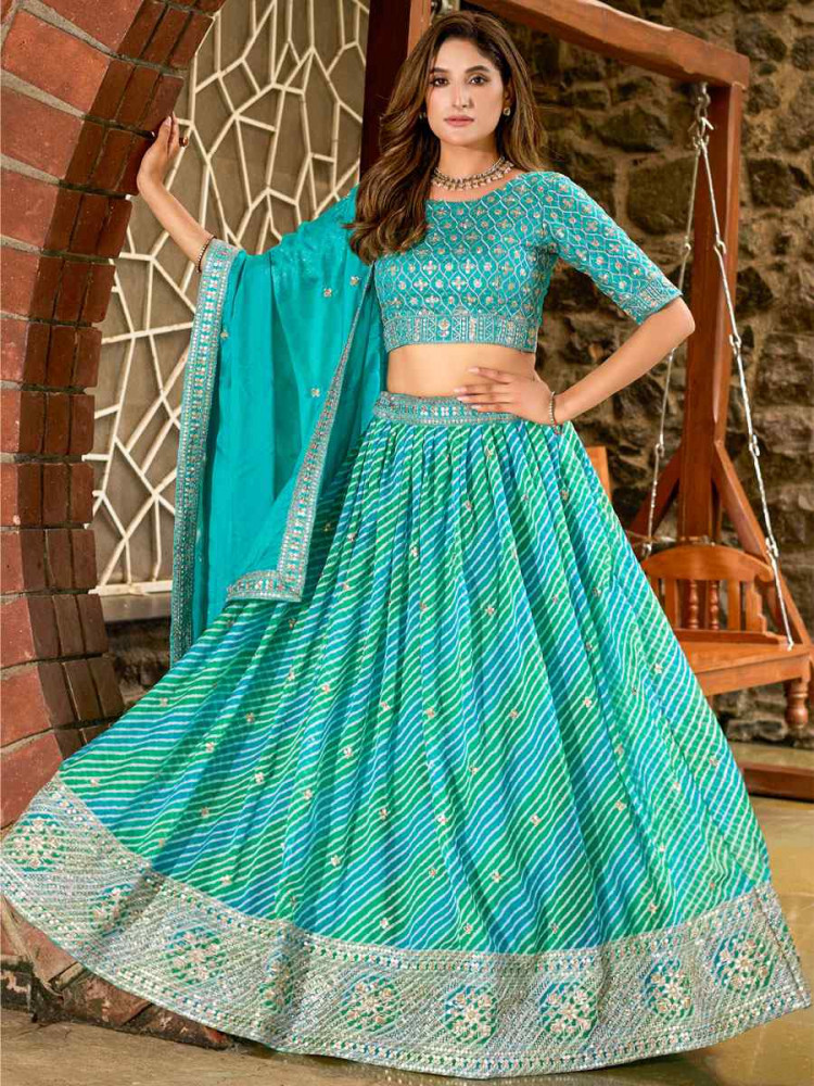 Image of Sky Blue Silk Embroidered Printed Wedding Reception Festival Heavy Border Lehenga Choli