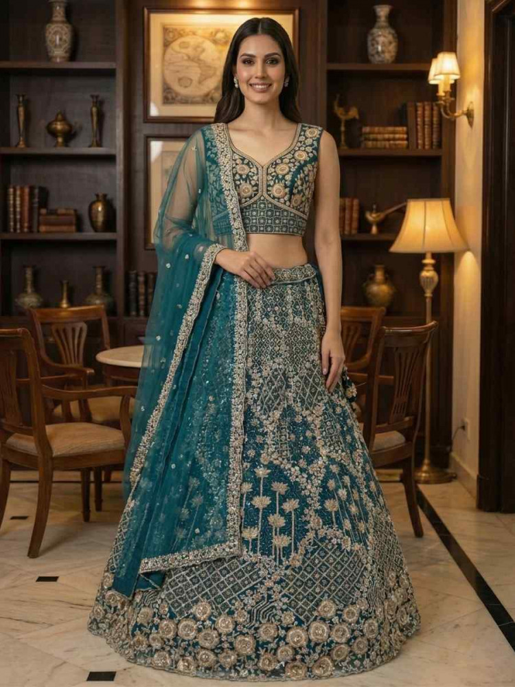 Image of Teal Blue Net Embroidery Wedding Reception Festival Heavy Border Lehenga Choli