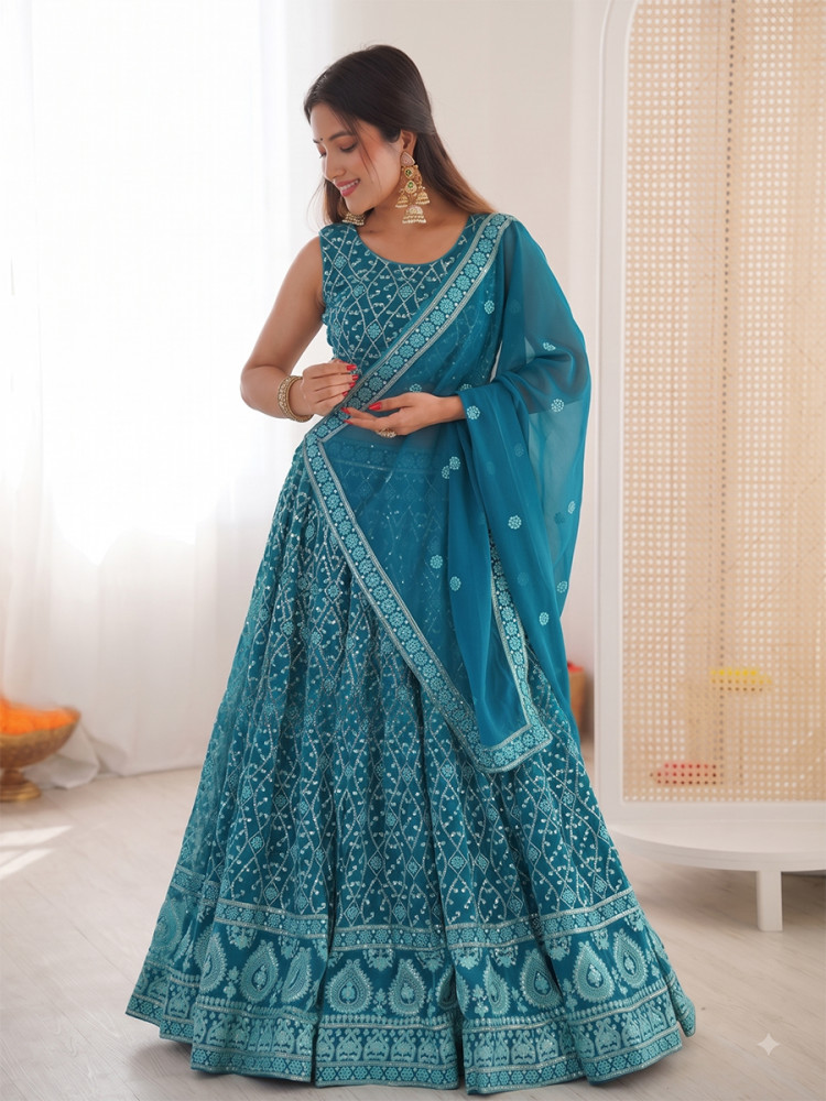 Image of Teal Blue Premium Faux Georgette Embroidery Sequins Wedding Reception Festival Party Wear Heavy Border Lehenga Choli