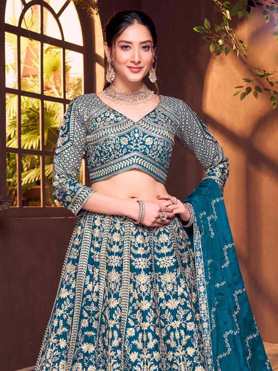 Teal Blue Silk Embroidered Wedding Reception Festival Ready Heavy Border Lehenga Choli