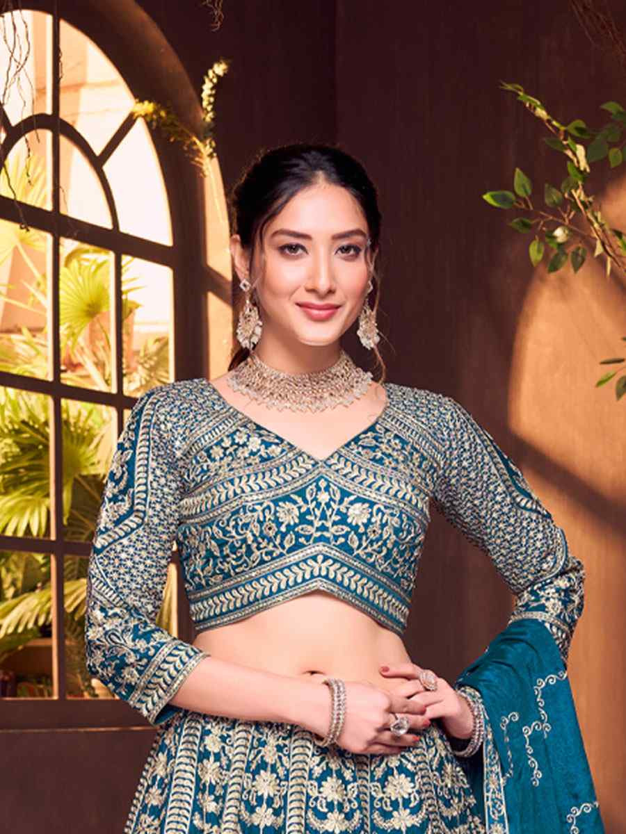Teal Blue Silk Embroidered Wedding Reception Festival Ready Heavy Border Lehenga Choli