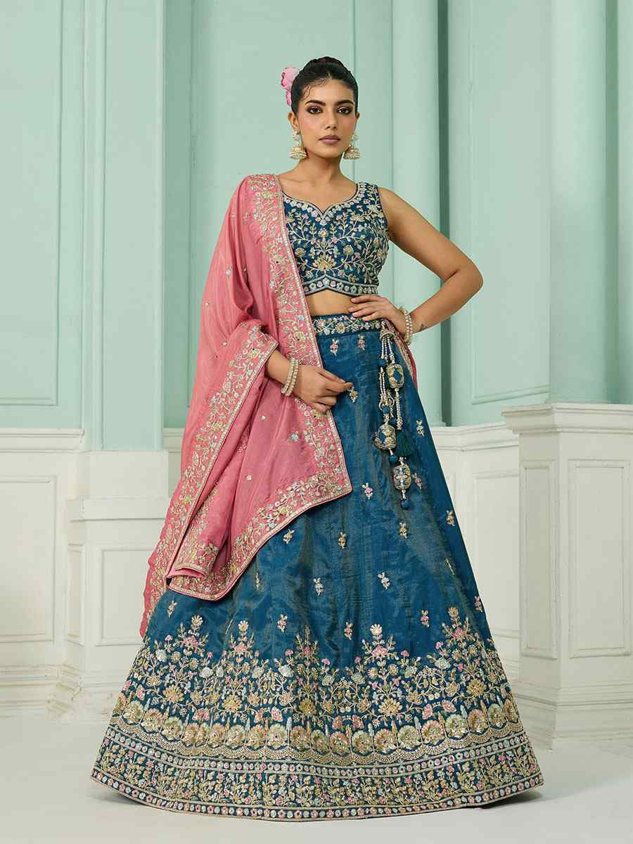 Teal Cosmos Silk Embroidered Wedding Reception Festival Heavy Border Lehenga Choli