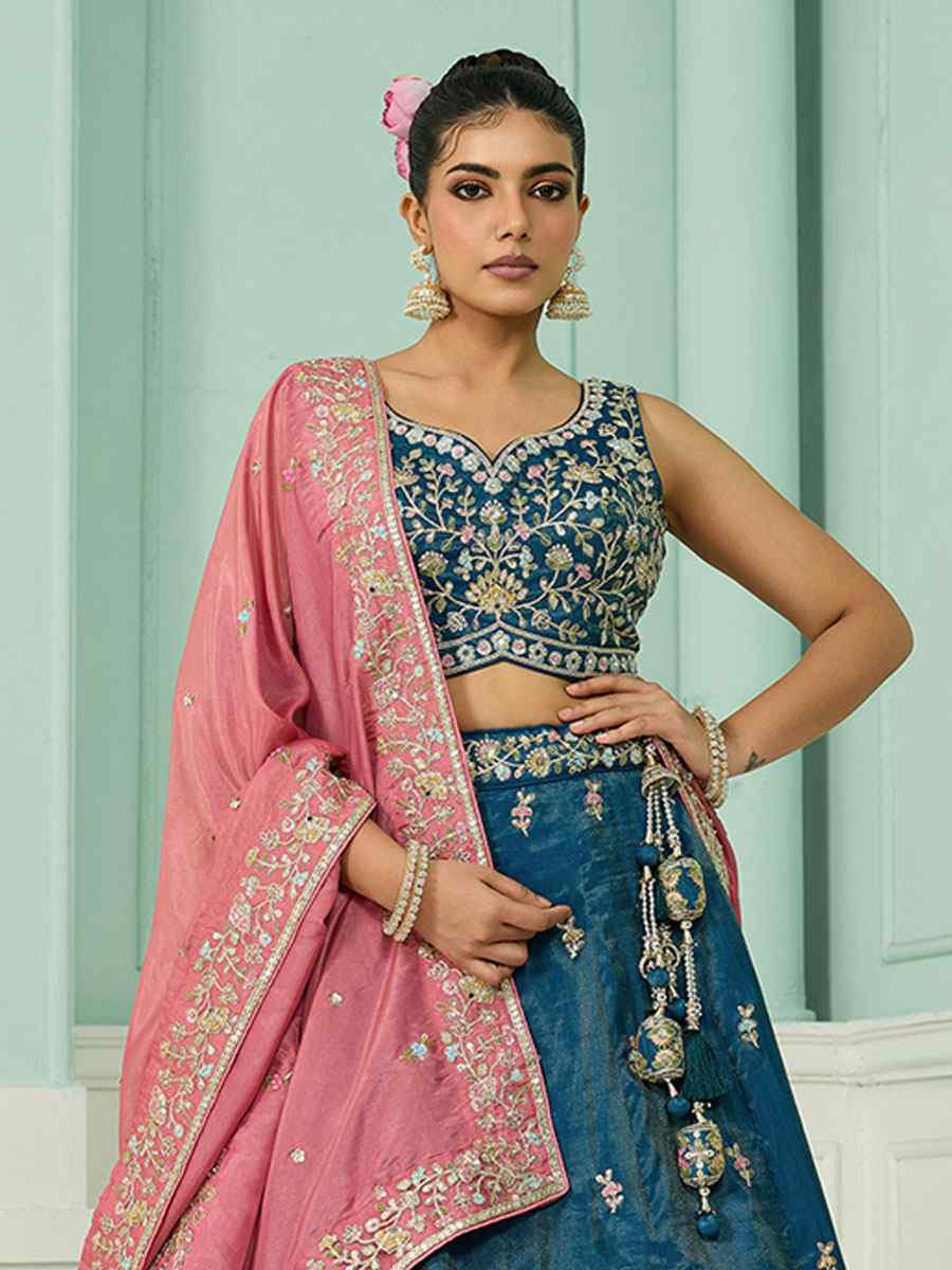 Teal Cosmos Silk Embroidered Wedding Reception Festival Heavy Border Lehenga Choli