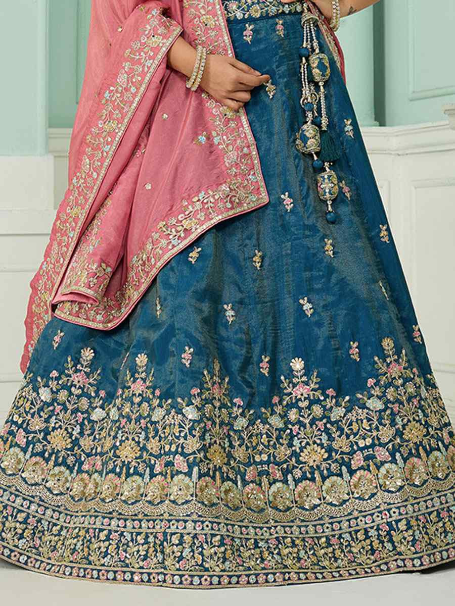 Teal Cosmos Silk Embroidered Wedding Reception Festival Heavy Border Lehenga Choli